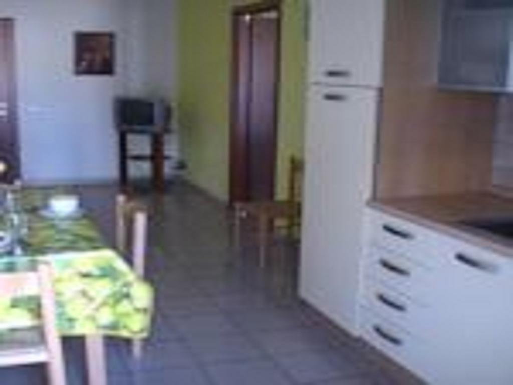 Appartamenti Marilu La Caletta Phòng bức ảnh